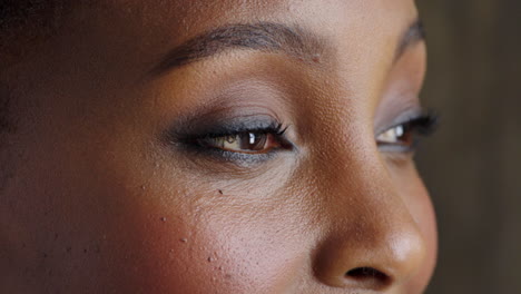 closeup of woman's eyes looking to the side