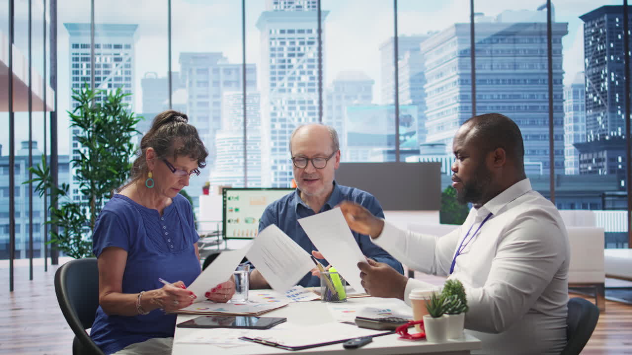 Mature couple meeting with a financial expert to develop a retirement plan