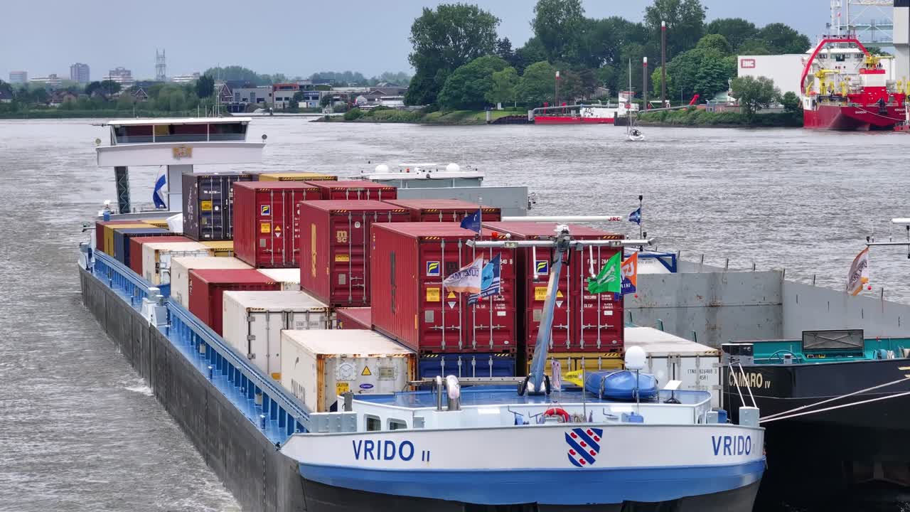 Cargo Barge 'VRIDO II' on a Waterway with Containers
