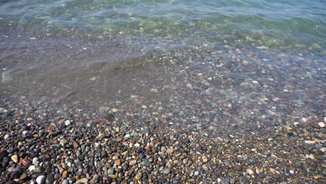 sea pebbles and ocean waves on the beach