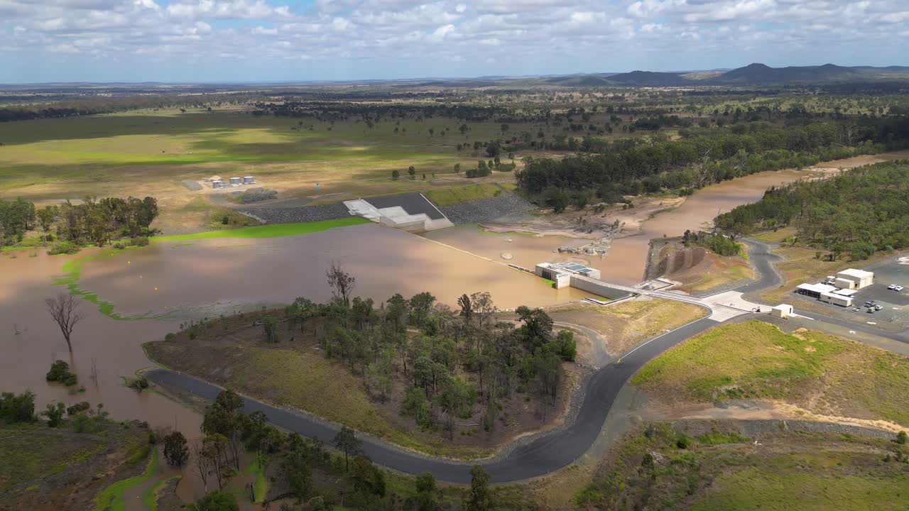 Left to right, wide aerial views over Rookwood Weir and the Fitzroy River, West of Rockhampton, Central Queensland, Australia.