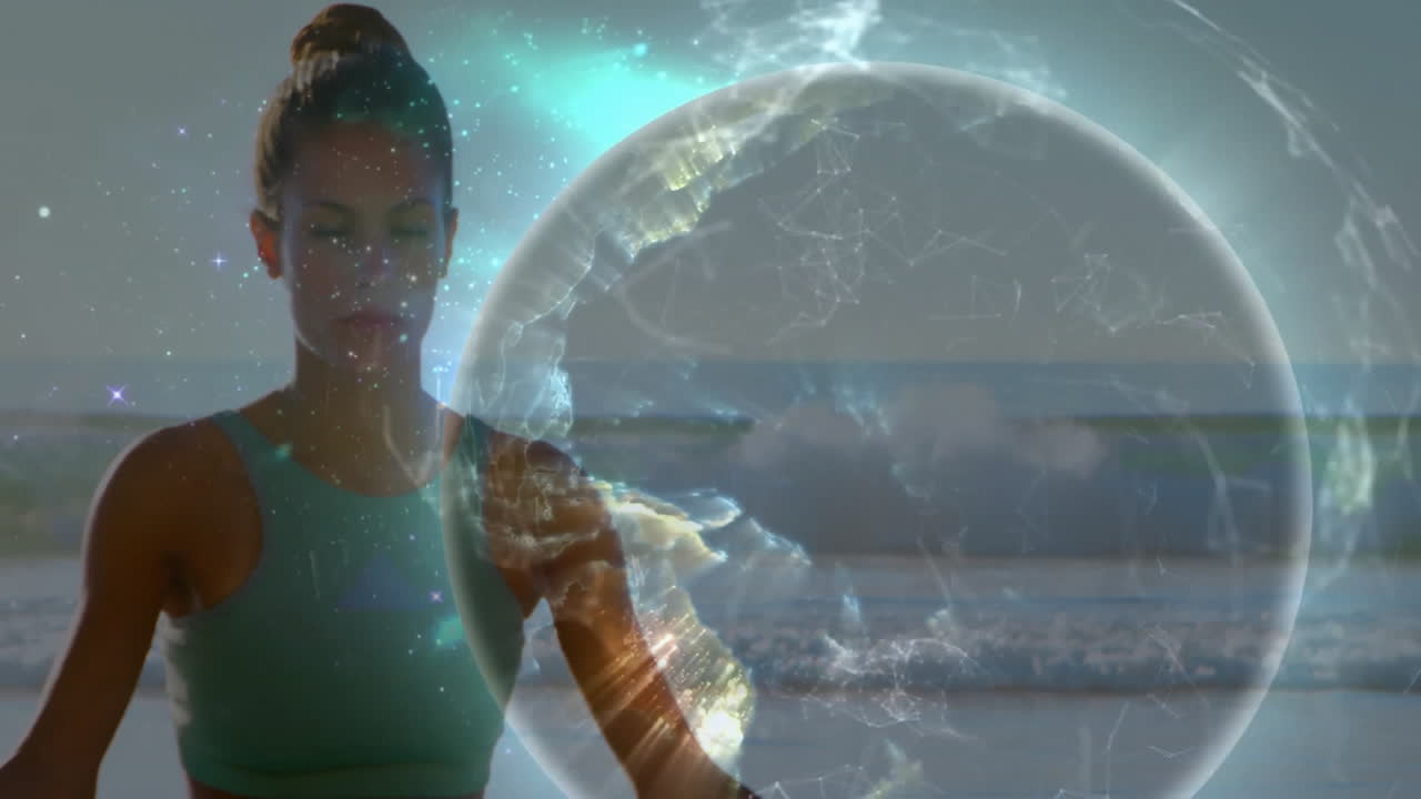 Woman meditating with glowing Earth animation over serene ocean background