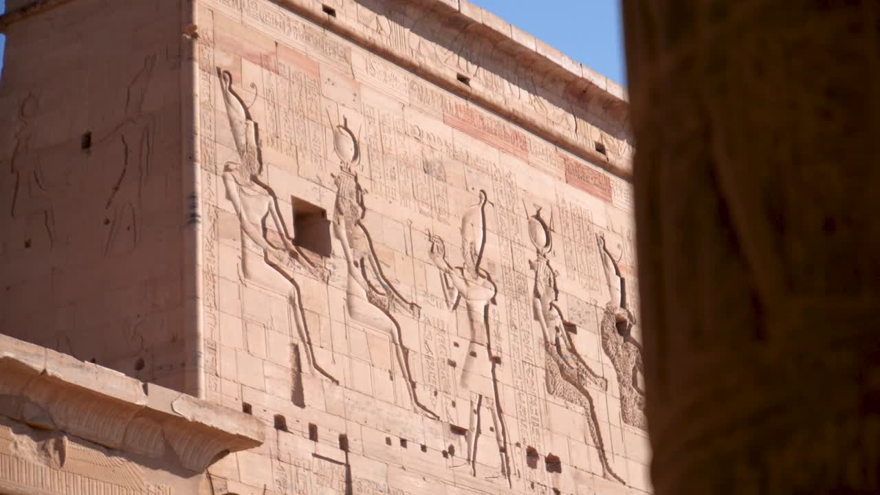 Detail of ancient hieroglyphs on a wall in an ancient temple Philae in Aswan, Egypt.