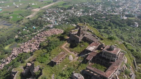 old historical fort in india resting on top of mountain with incredible surrounding landscape