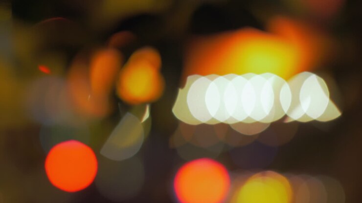 Abstract background with defocused city lights at night