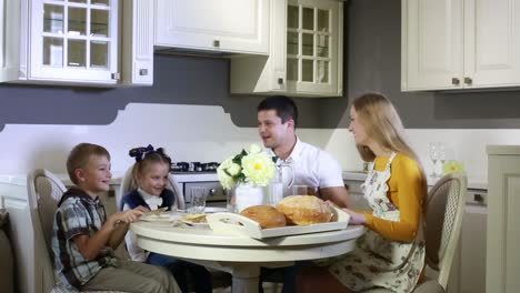 family having breakfast at the table