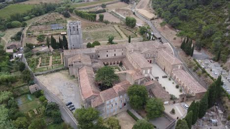 medieval abbey in the south of france | panning aerial