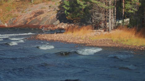 waves crash onto the rocky shores