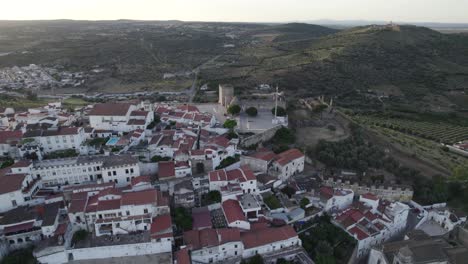 birds-eye view of city center and vast countryside