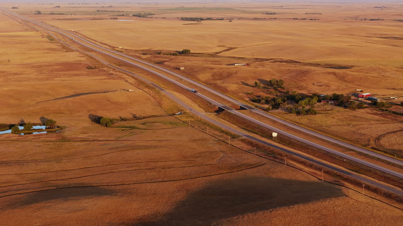 Highway Through the American Plains at Sunrise