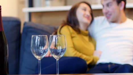 Romantic-couple-interacting-in-living-room