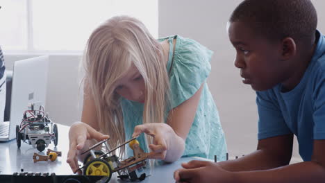 Two-Students-Building-And-Programing-Robot-Vehicle-In-After-School-Computer-Coding-Class