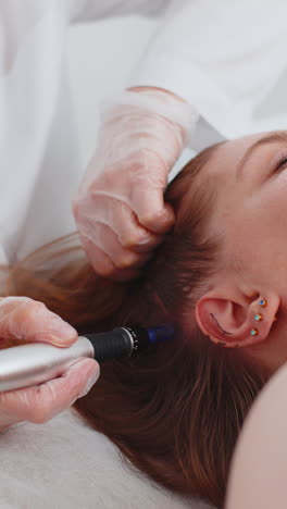 Trichologist-doing-woman-hair-regeneration-procedure,-dermapen-microneedling,-vitamin-injections