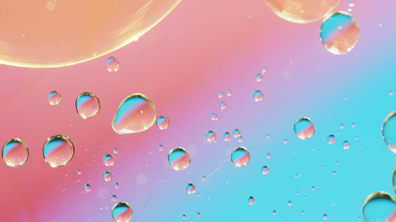 Animation of bubbles moving on red and blue background with copy space