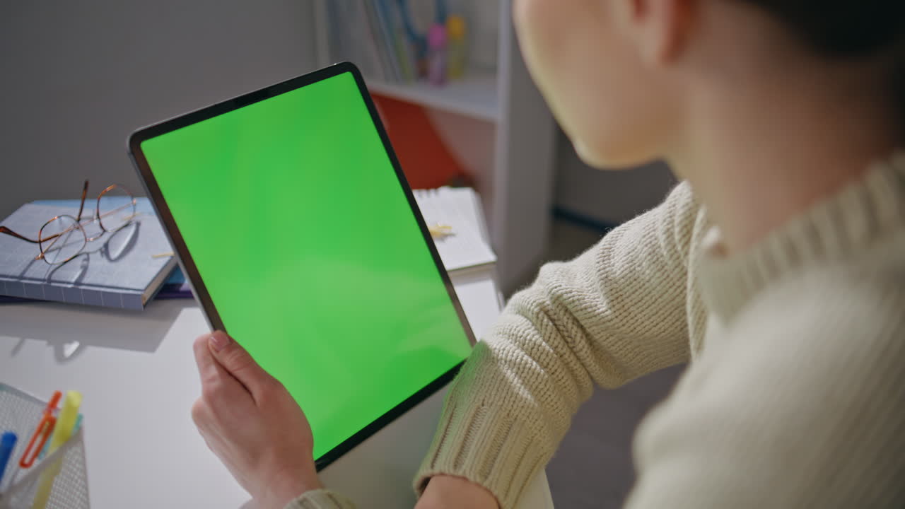 Mockup tablet woman scrolling display browsing social media at home closeup