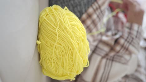 ball of yellow yarn