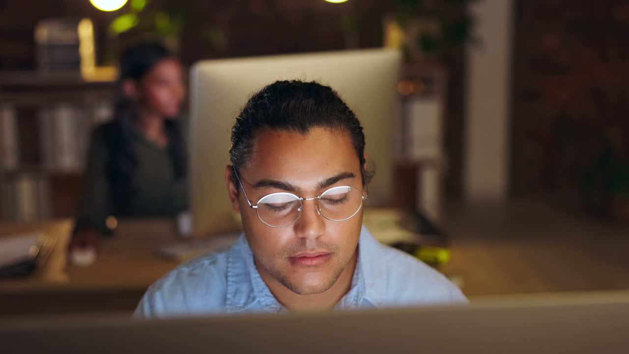 Face, computer and late with a man at work