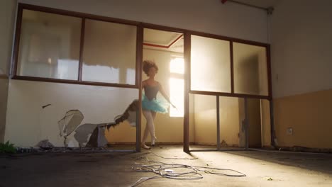 female dancer in an empty warehouse