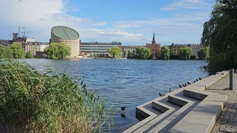 the view of the planetarium and the waterfront in copenhagen, denmark