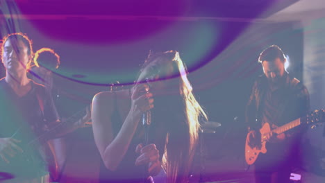 band performing on music industry stage, with mic and guitar and floating sound wave graphics