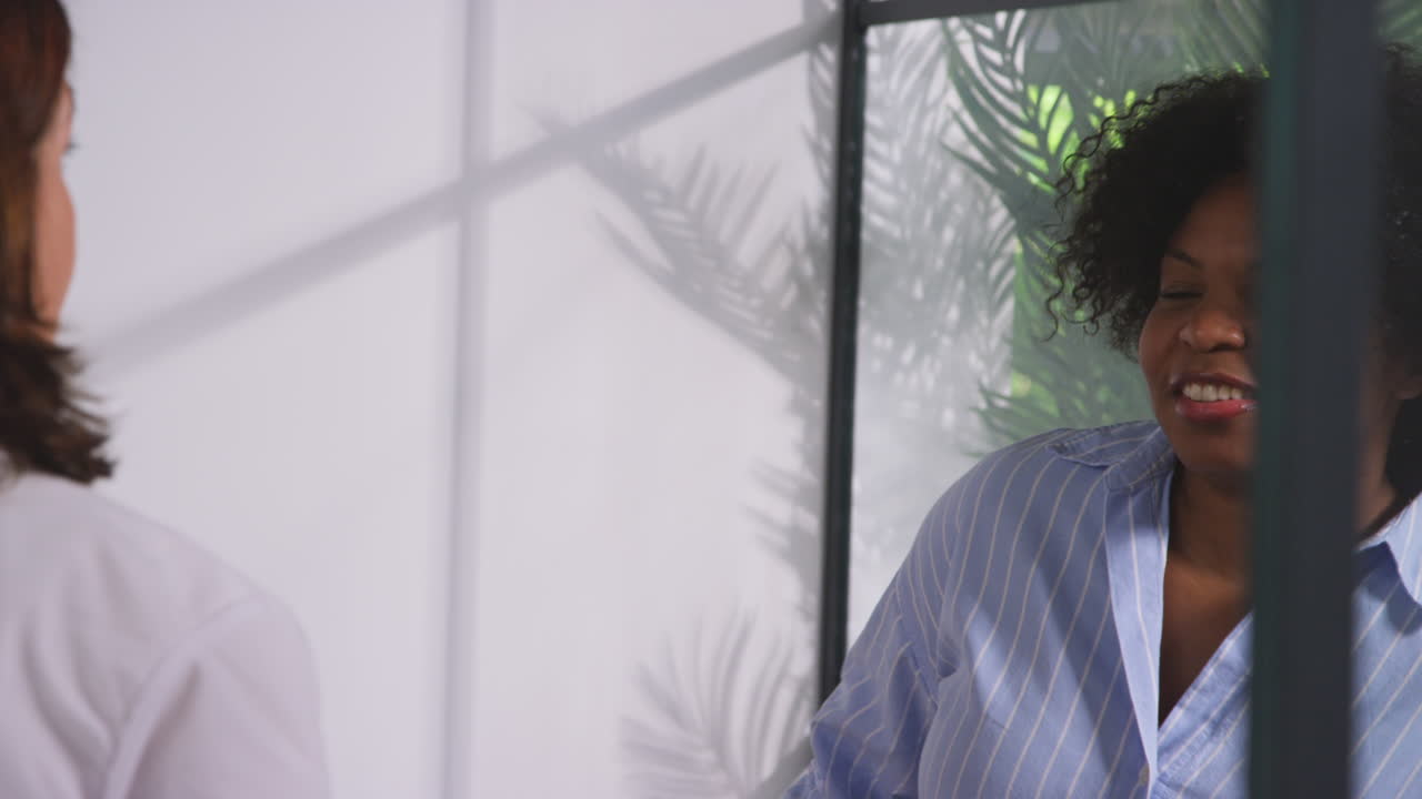 Relieved Woman Being Given All Clear By Doctor Or Oncologist At Meeting In Treatment Clinic For Breast Cancer In Hospital 7