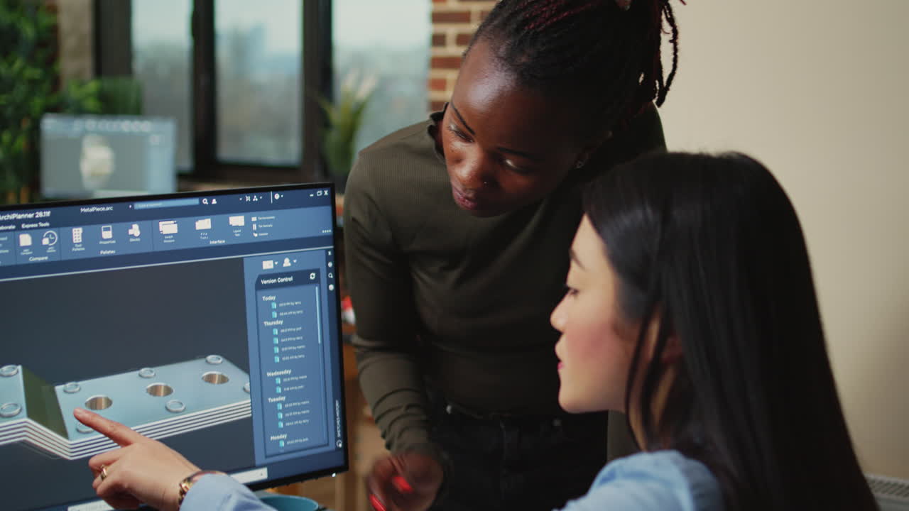 Creative agency diverse team editing video footage using color grading