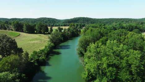 idyllic view of river and vegetation in war eagle, benton county, arkansas, united states - aerial drone shot