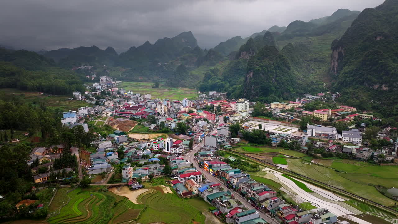 Drone view over Dong Van town among karst mountains in Northern Vietnam