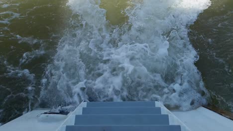 foamy wake with a white appearance caused by the ship - static shot