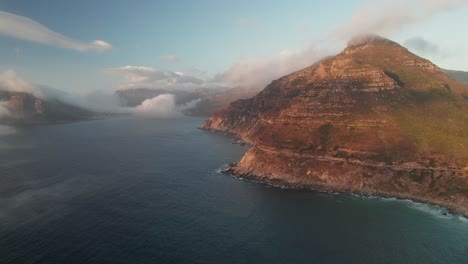 chapman's peak drive at noordhoek bay during sunset in cape town, south africa