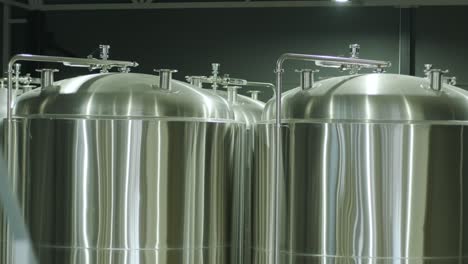 modern craft brewery. craft beer production. modern equipment in brewery, metal tanks, alcoholic drink production