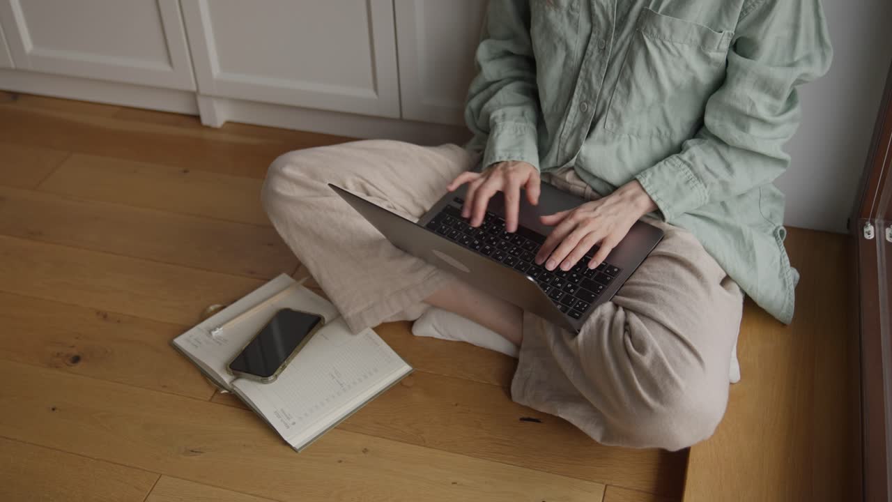 Woman Working from Home on Laptop