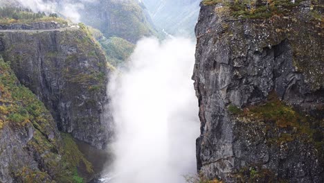 dolly-up-along-the-steep-walls-of-Voringfoss-at-Norways-enormes-waterfall