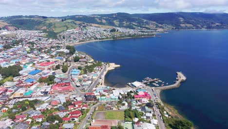 aerial view flying over city of ancud in province of chiloe