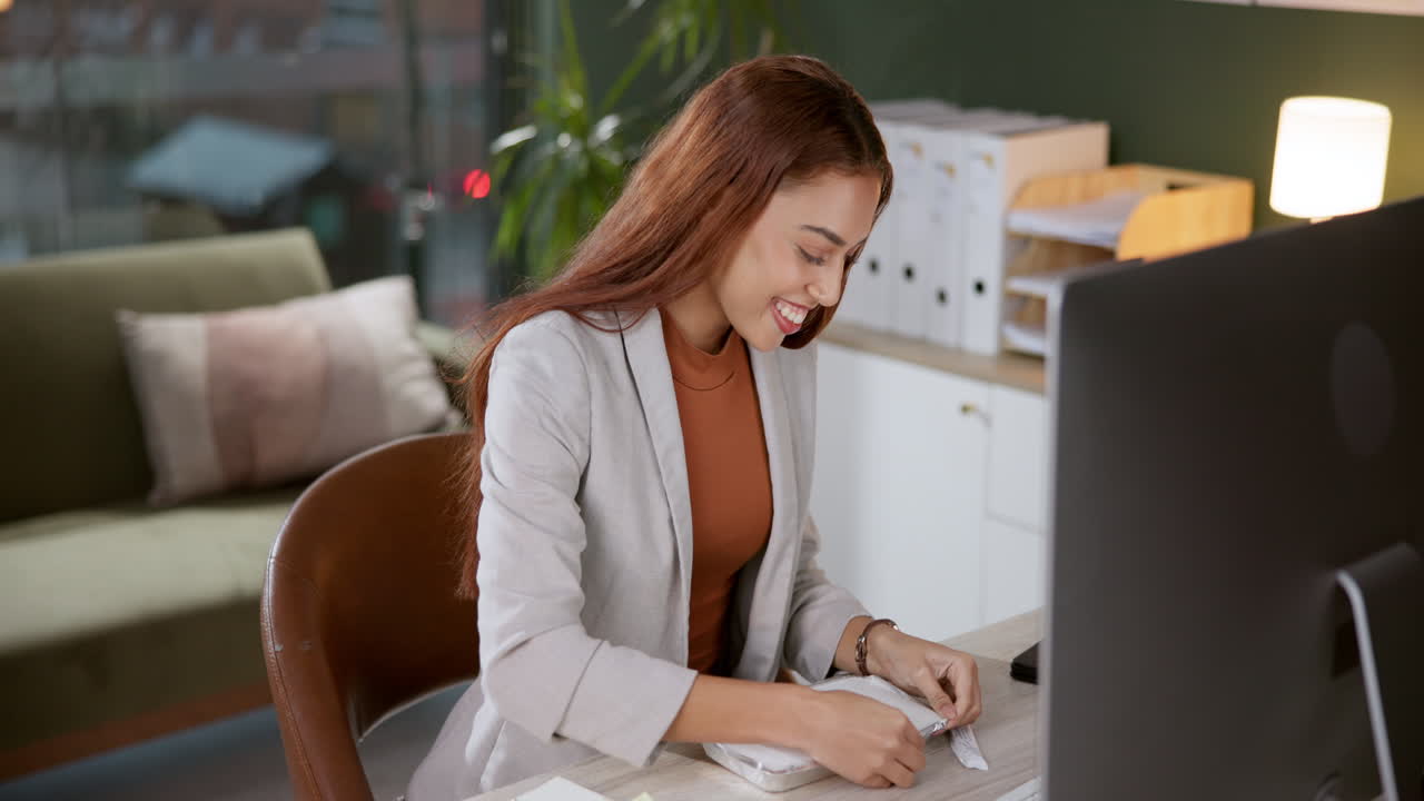 Woman having lunch at her desk