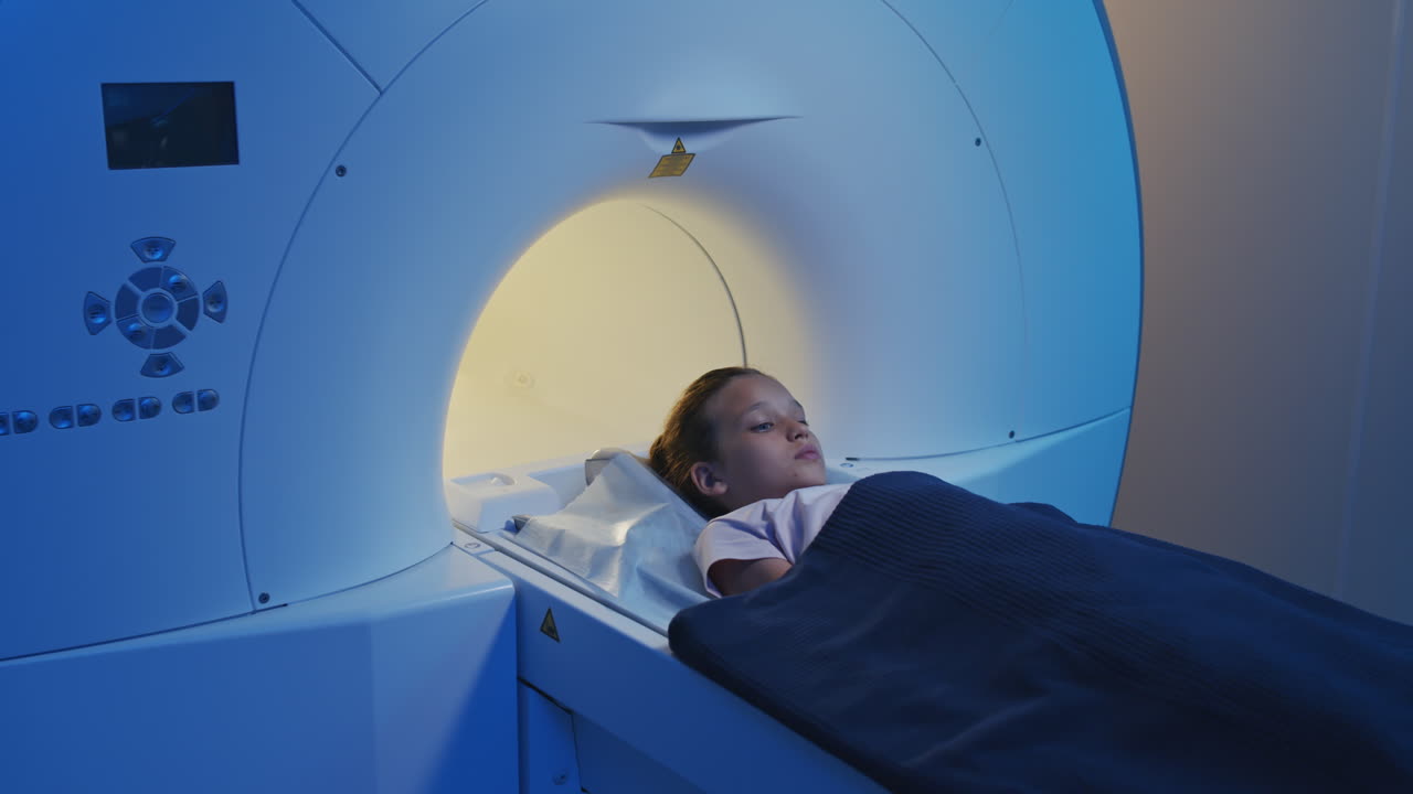 Girl on Scanner Table for MRI