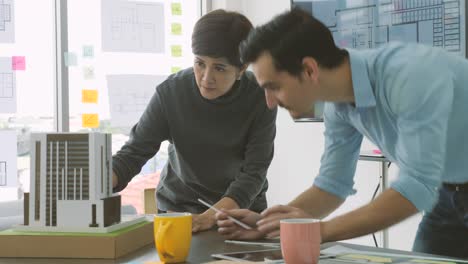 team of creative architects working together in a architect studio