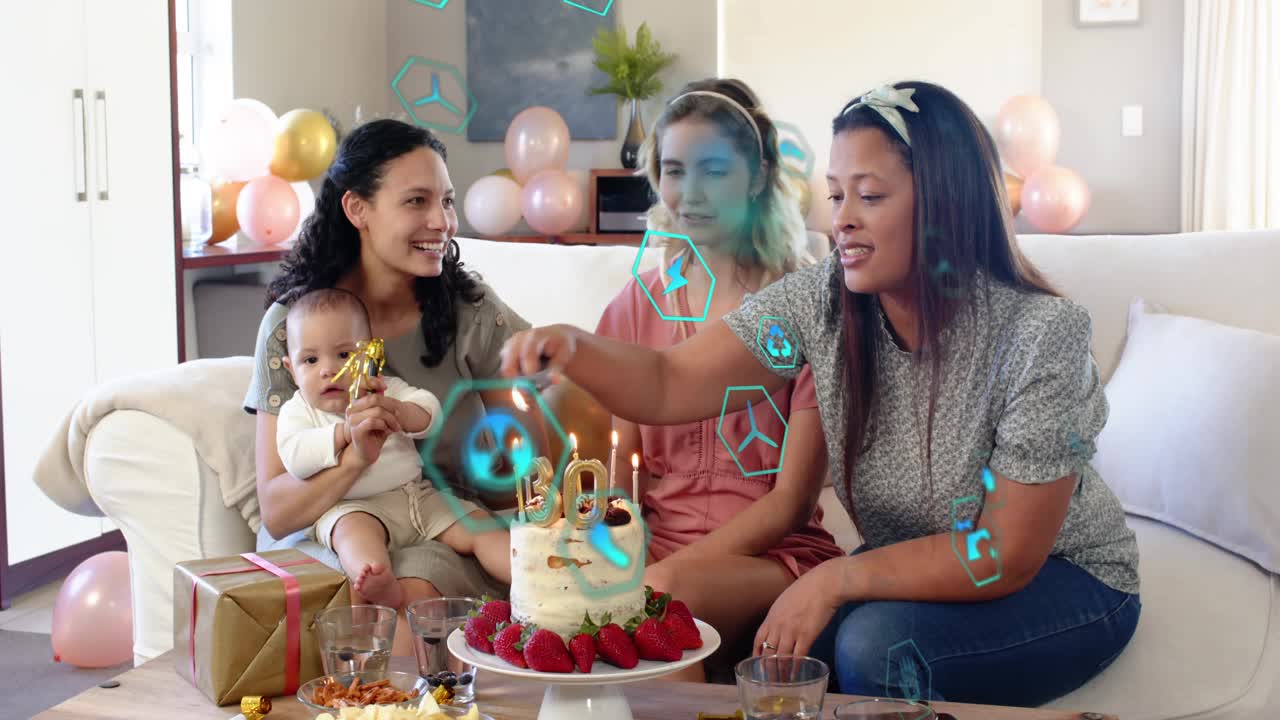 Right woman reaching for lighter and lighting 30 candles, group celebrating with technology overlay