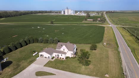 Aerial-Drone-Footage-Storm-Damaged-Grain-Elevators-Destroyed-By-High-Winds-And-Bad-Weather,-Midwest-Farm-Country,-Iowa