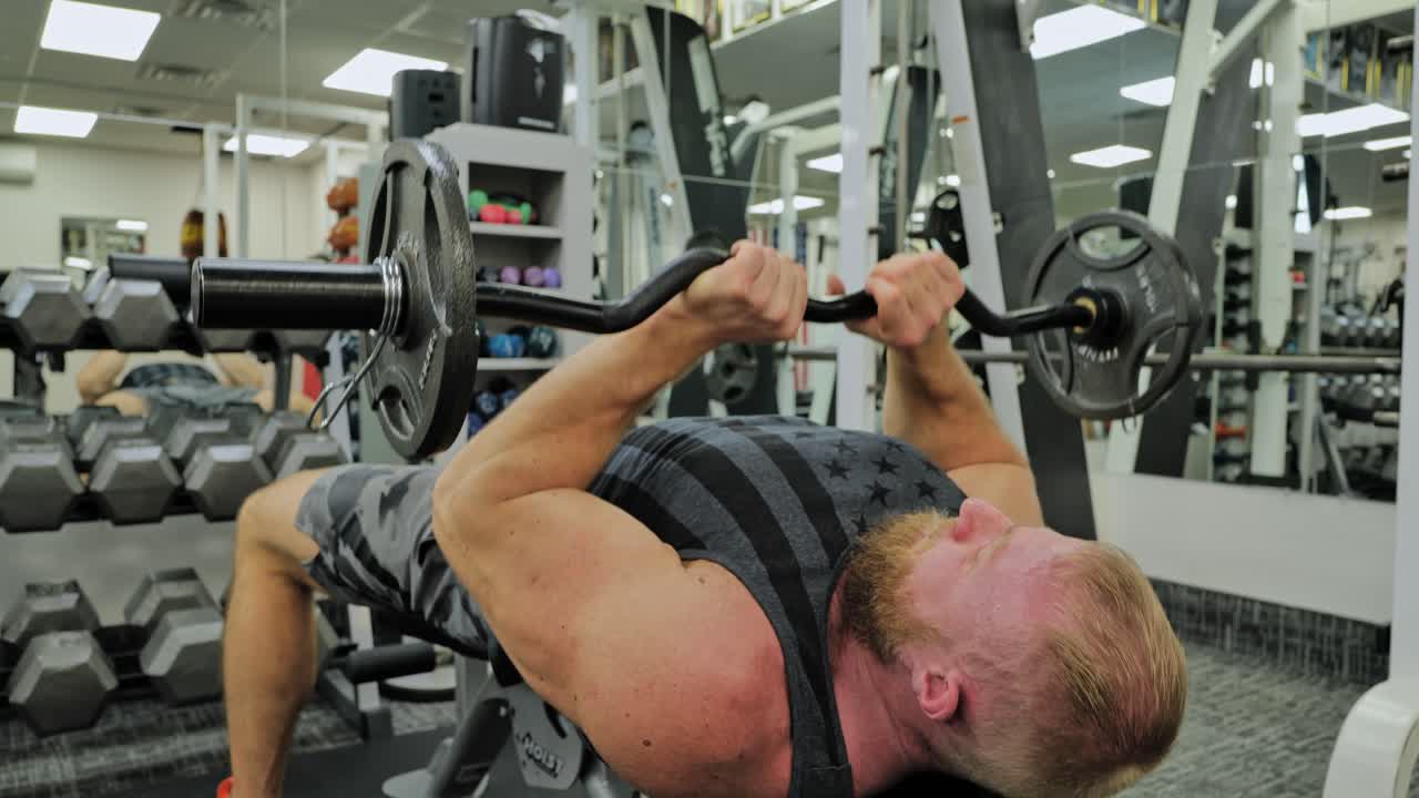 Sportsman Doing Exercises With Weight