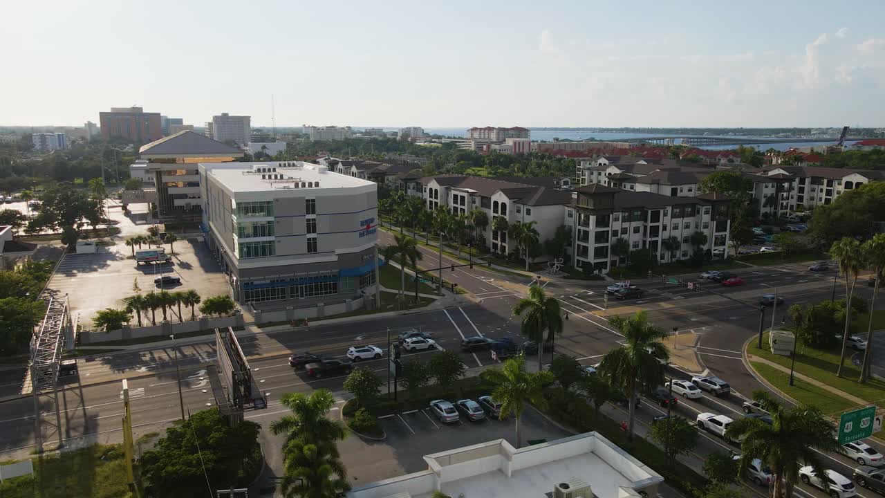 Aerial view of downtown Bradenton, FL, featuring the intersection of Manatee Ave and US-301. Orbit Right Day W