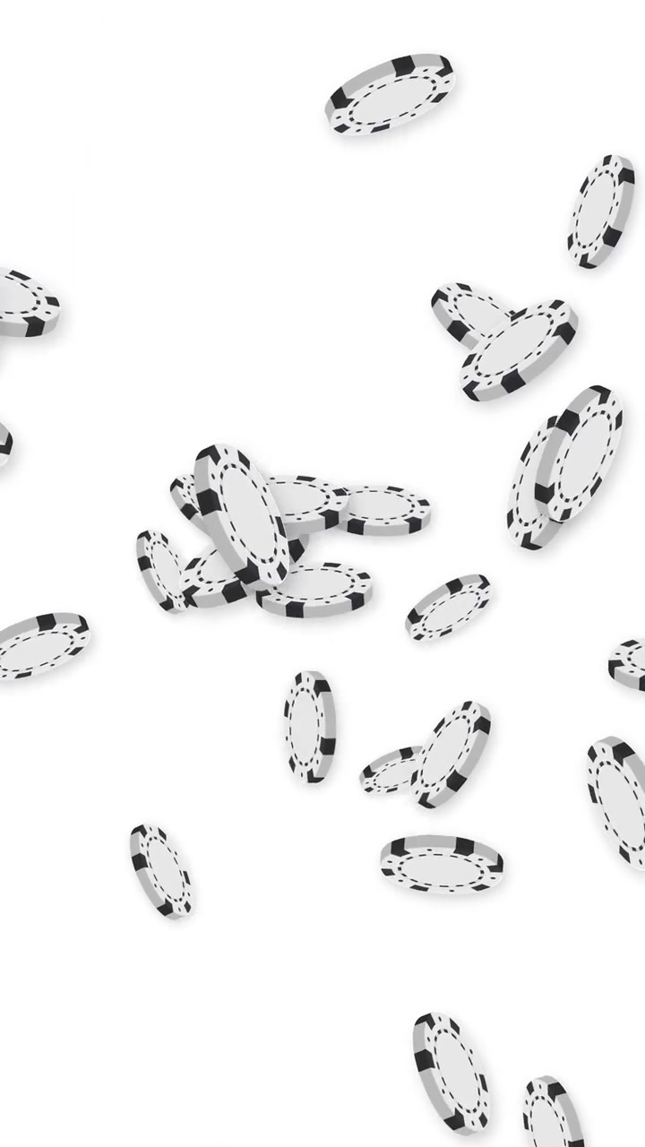 White and Black Casino Chips Falling Against White Background