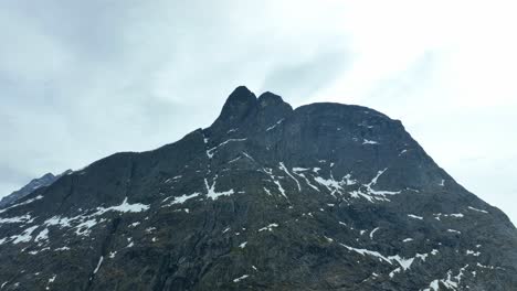 romsdalshornet mountain in norway - aerial looking up at mountain known as the horn of the romsdalen valley