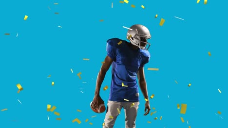 Animation-of-confetti-falling-over-american-football-player-with-ball-on-blue-background