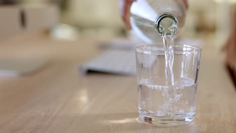 pouring water for hydration and refreshment