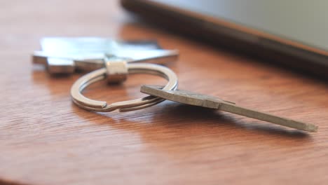 keys on a wooden desk