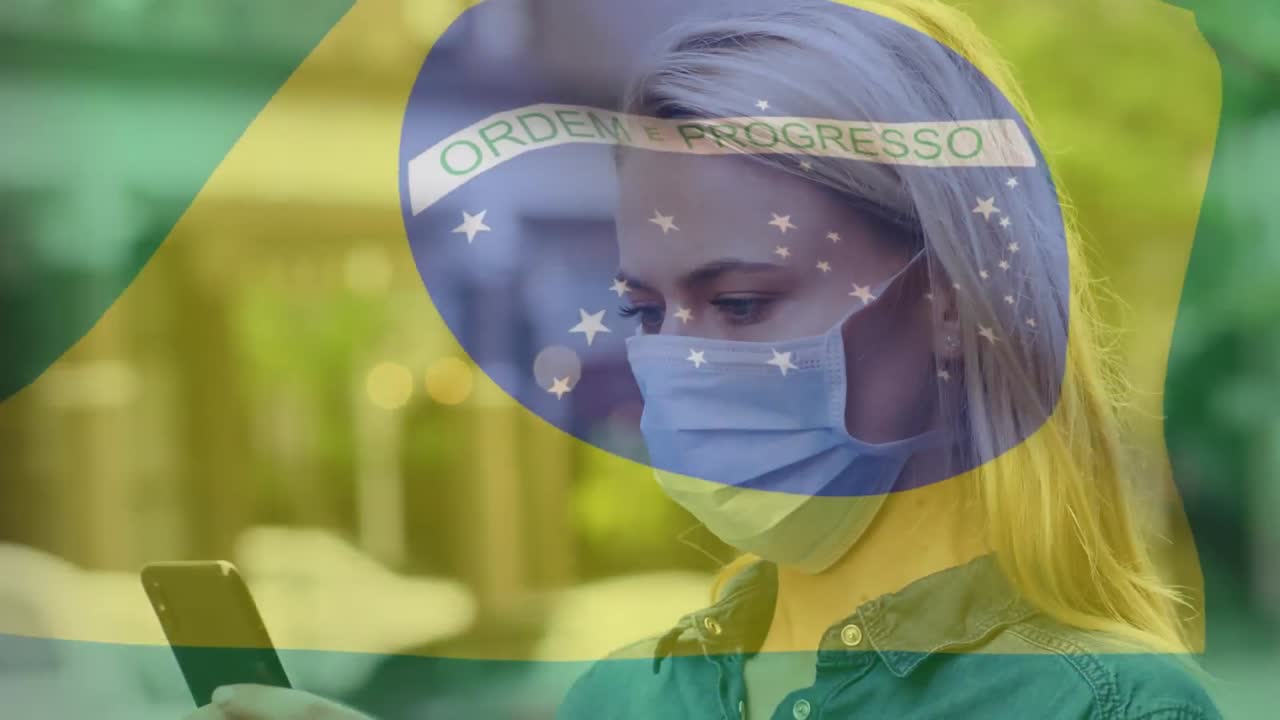 Brasilian lipun animaatio liehumassa kasvomaskia käyttävän naisen yllä.