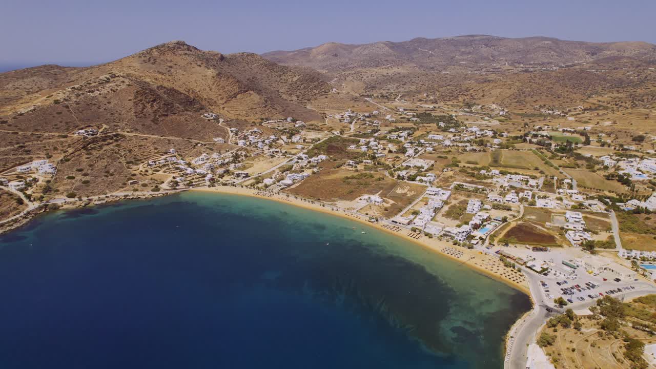 Aerial View of a Beautiful Coastal Village and Beach on a Greek Island