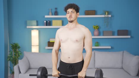 스포츠 웨이트 트레이닝을 하는 젊은 운동 선수. 건강한 라이프 스타일.