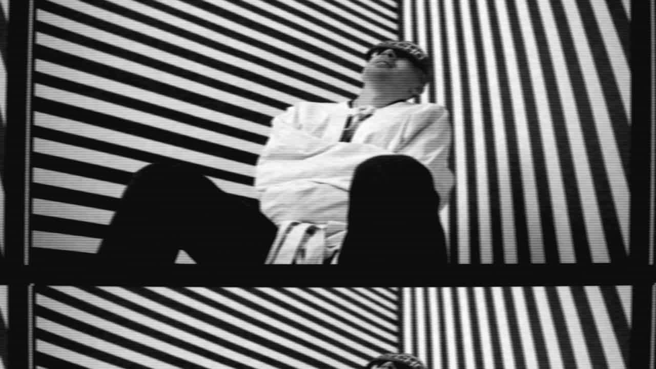 Bound Man in Striped Room